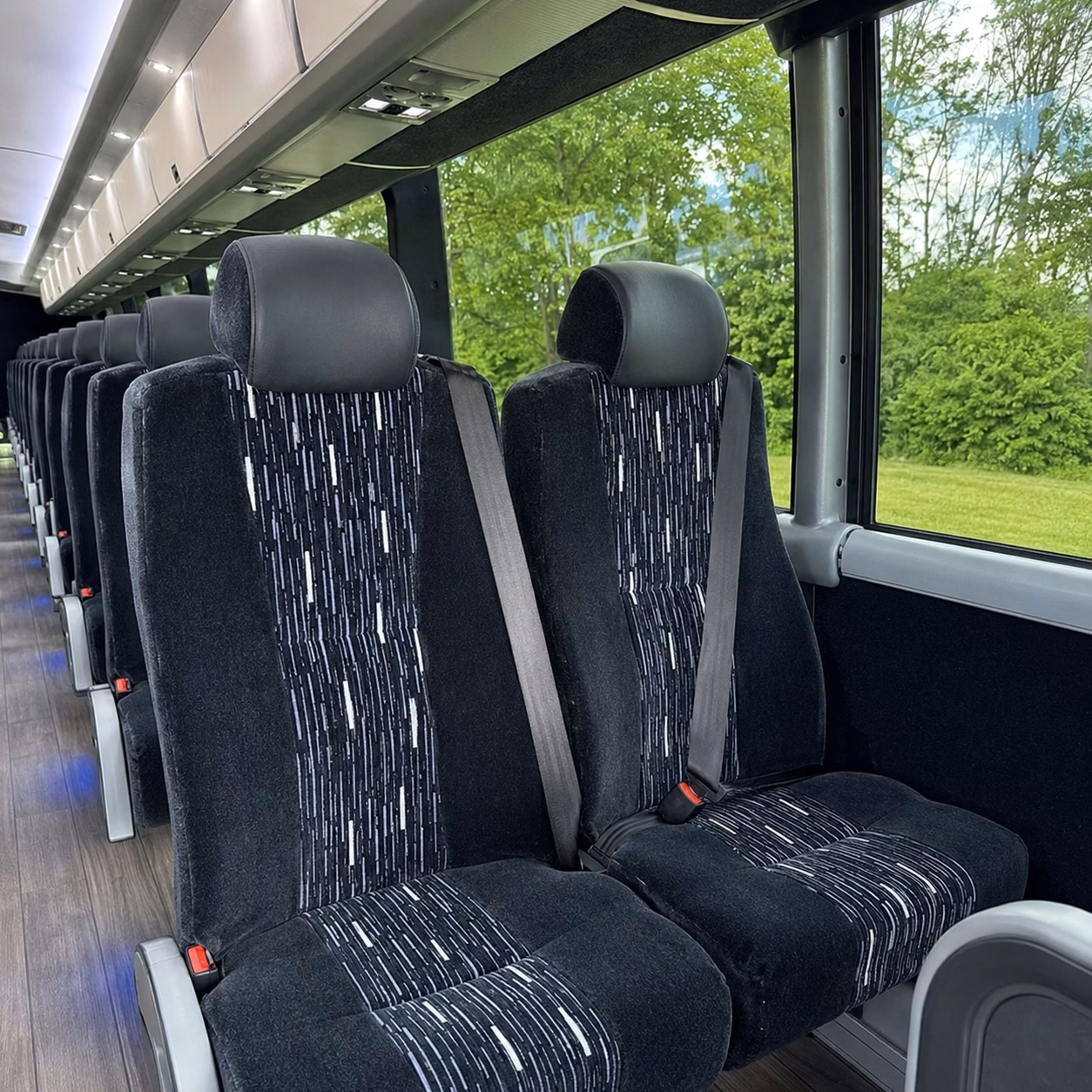 how bus type and size affect charter bus prices in irving texas